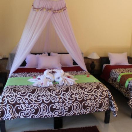 Mans Cottages & Spa Pemuteran Zimmer foto