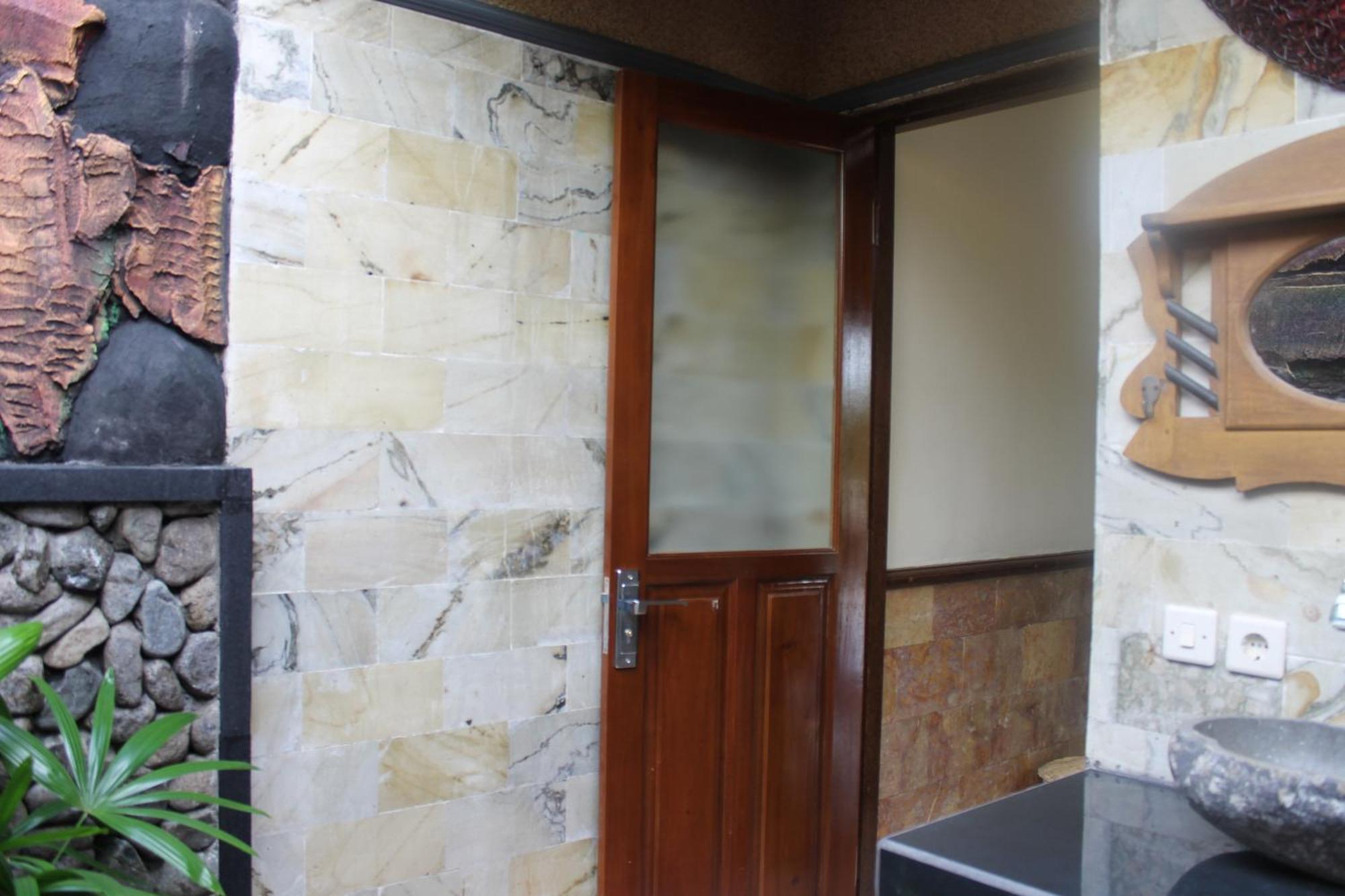 Mans Cottages & Spa Pemuteran Zimmer foto